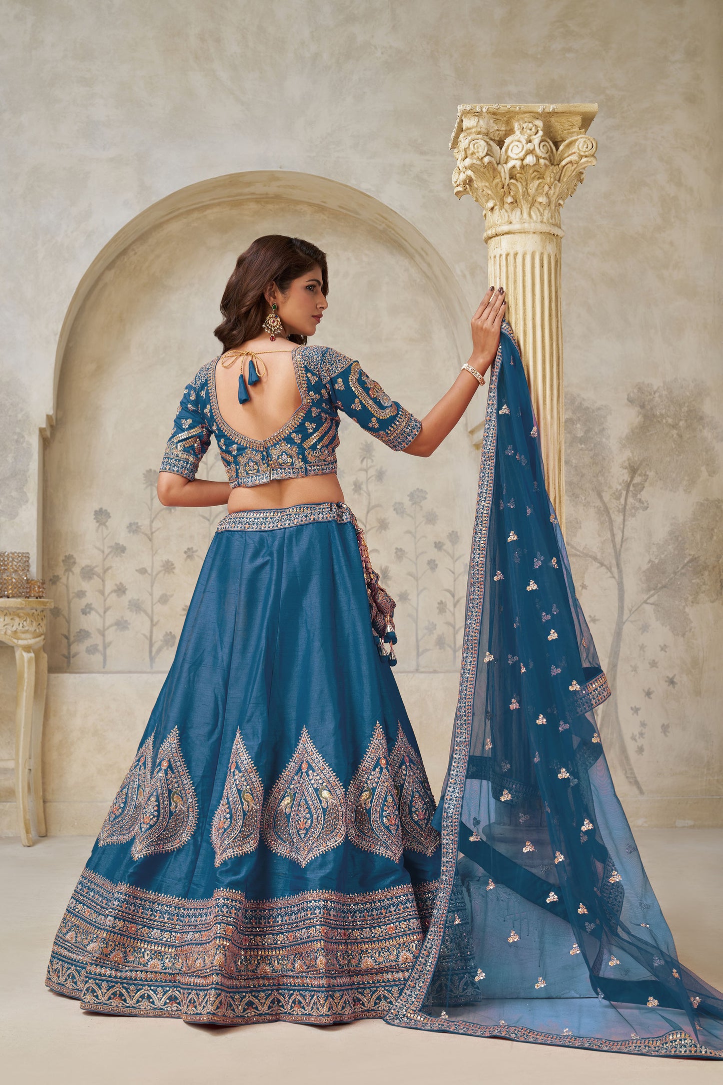 Teal Blue Silk Wedding Lehenga with Leaf & Peacock Motifs