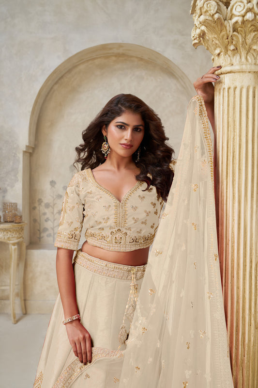 Beige Silk with Leaf Embroidery & Peacock Motifs Wedding Guest Lehenga