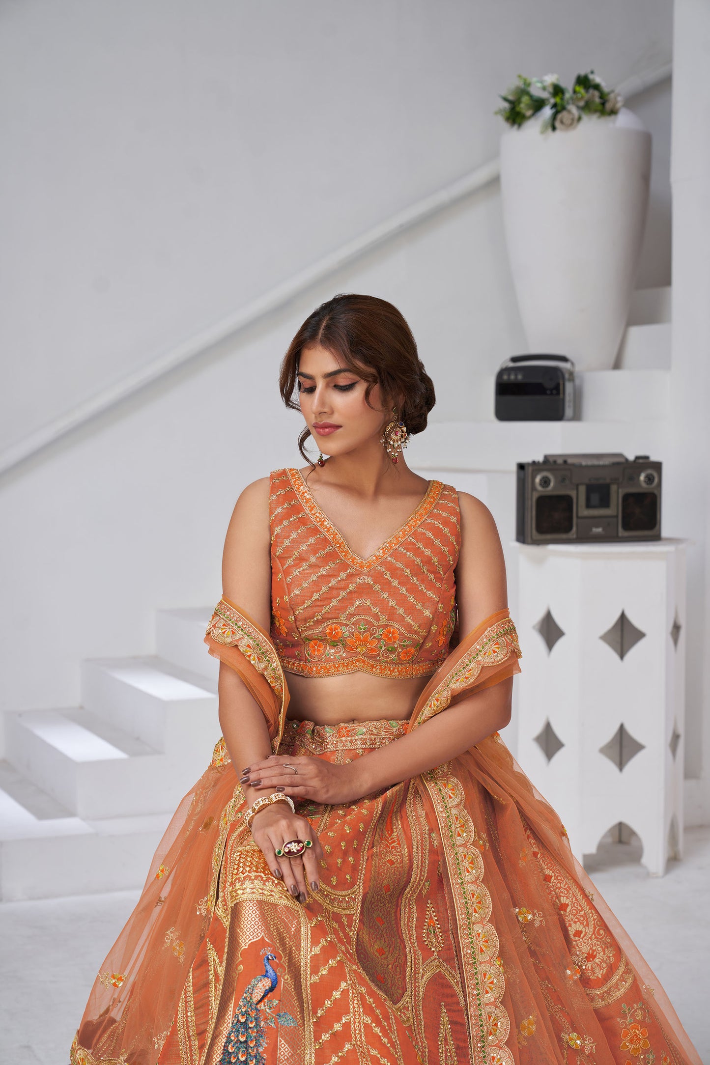 Rust Orange Raw Silk Peacock Motifs & Zari Embroidered Sangeet Lehenga