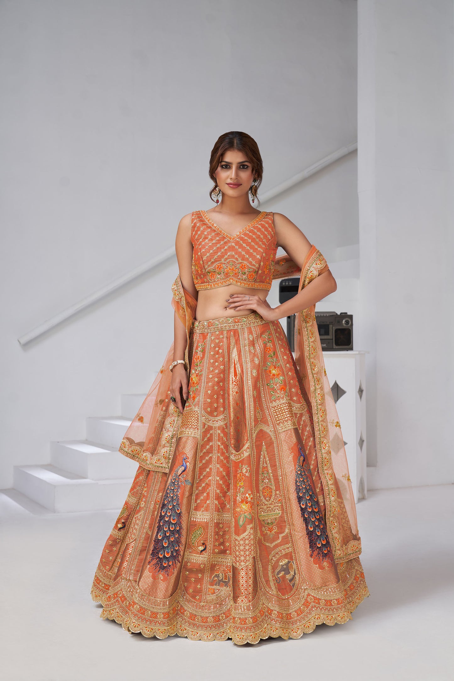 Rust Orange Raw Silk Peacock Motifs & Zari Embroidered Sangeet Lehenga