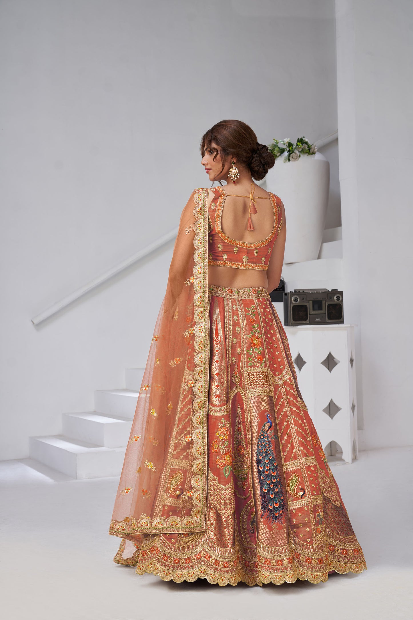 Rust Orange Raw Silk Peacock Motifs & Zari Embroidered Sangeet Lehenga