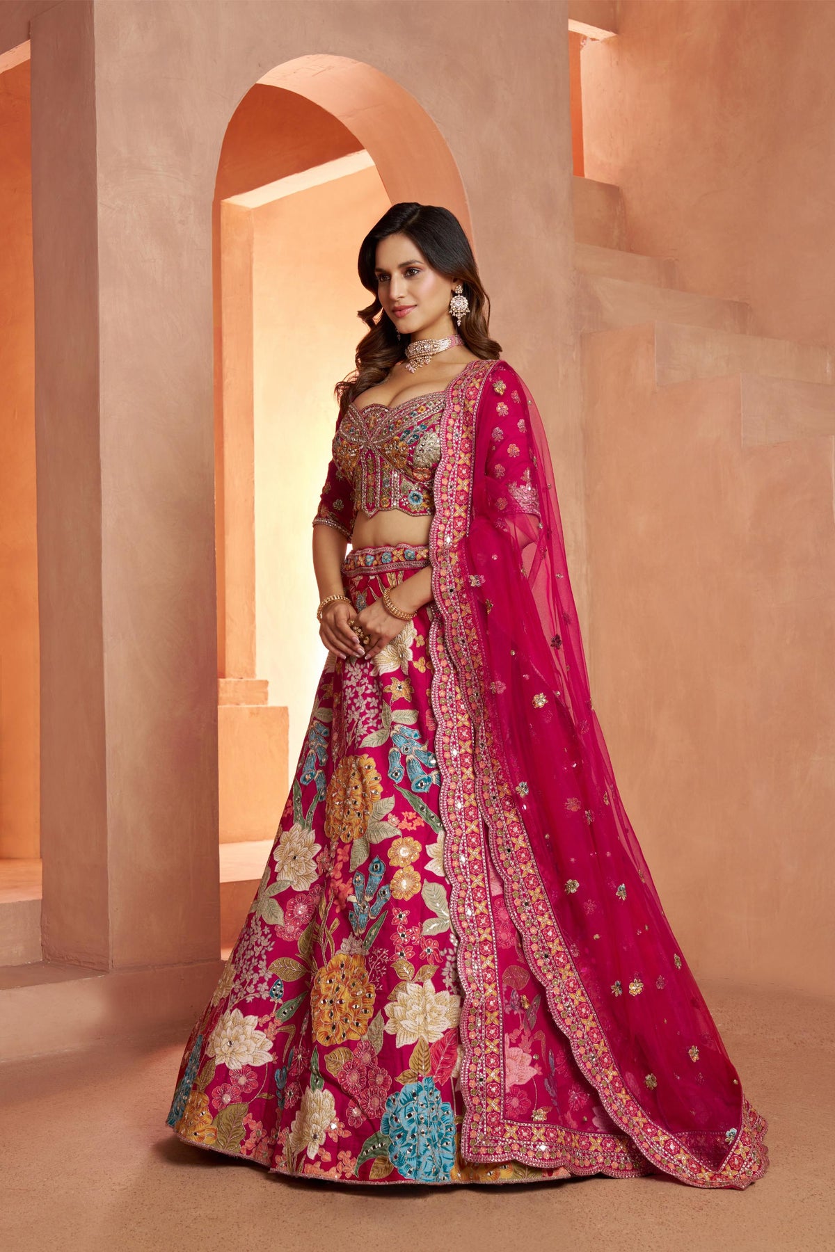 Rani Pink Dola Silk Mirror Work & Floral Motifs Bridal Lehenga
