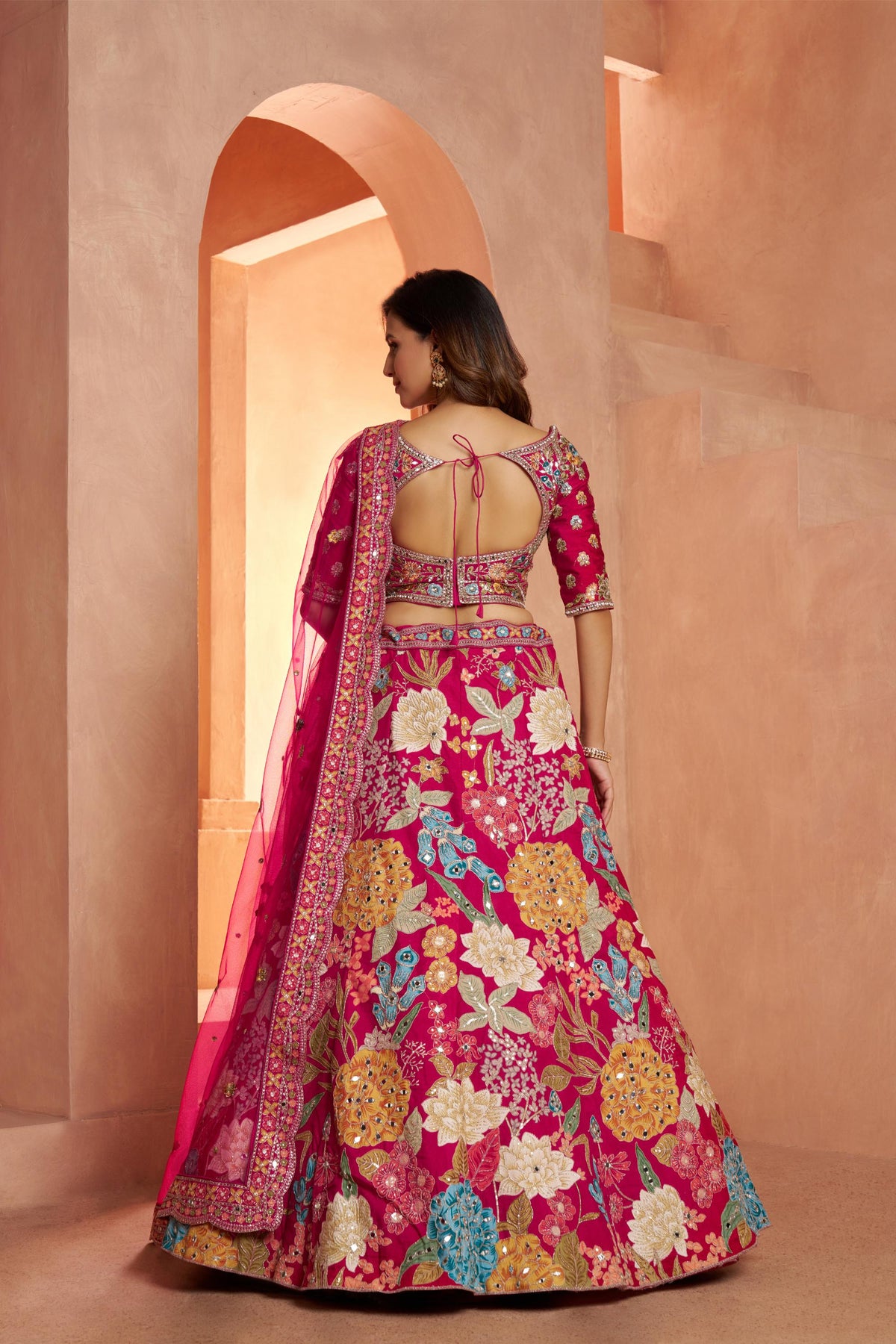 Rani Pink Dola Silk Mirror Work & Floral Motifs Bridal Lehenga