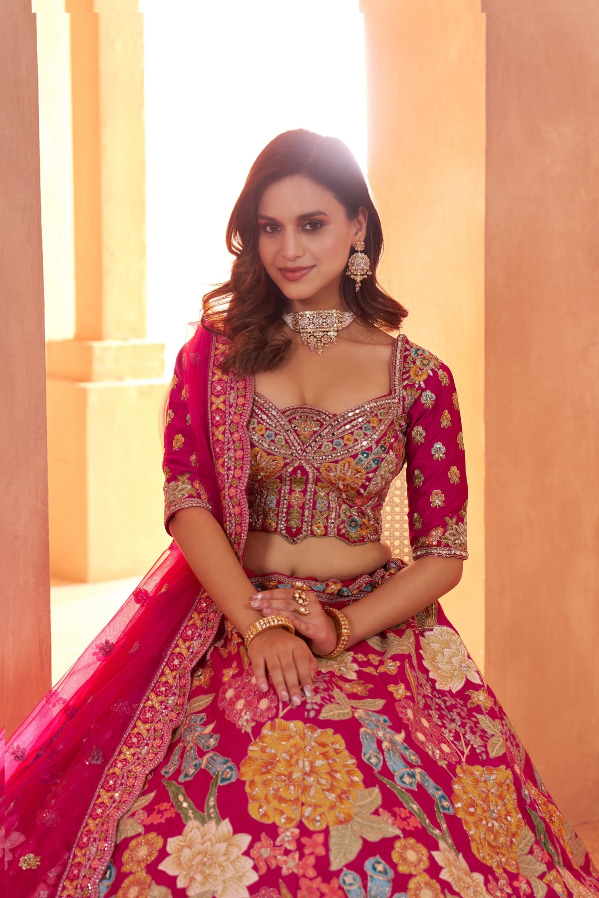 Rani Pink Dola Silk Mirror Work & Floral Motifs Bridal Lehenga