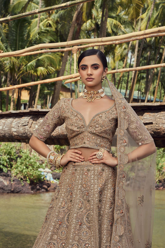 Mahavir Machine Embroidered Net Light Golden Bridal lehenga