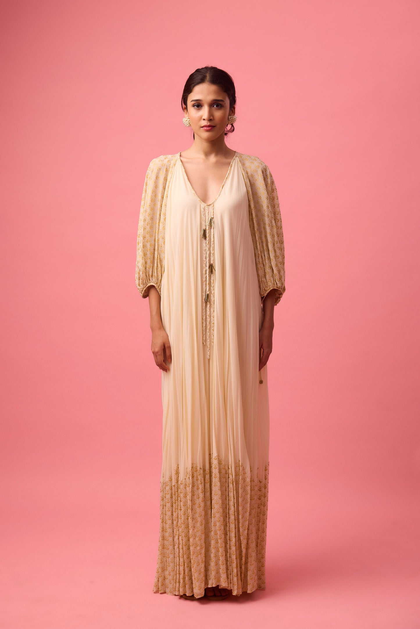 Off white Georgette dress with the detailing of foiling and dangling in sleeve