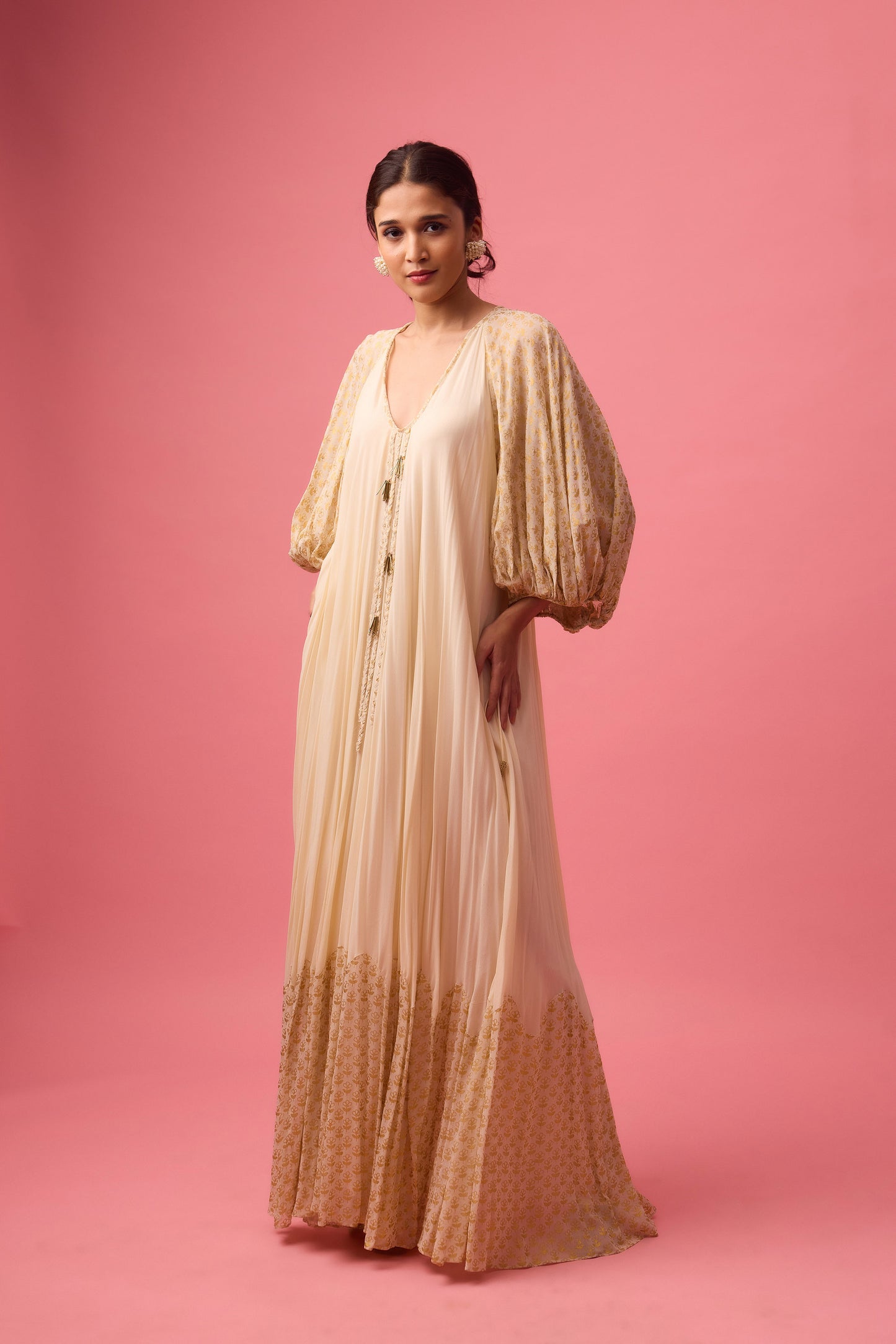 Off white Georgette dress with the detailing of foiling and dangling in sleeve