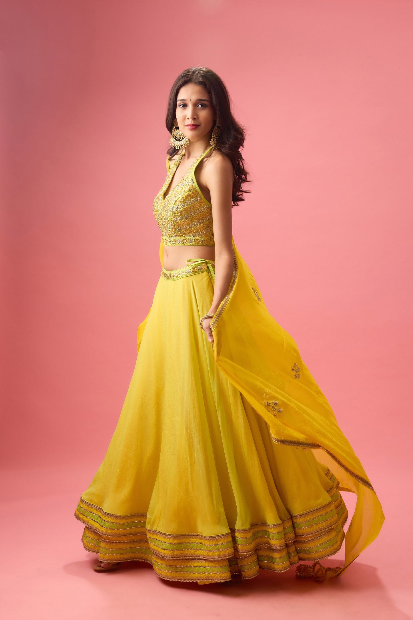 Lime green double layer organza lehenga paired with blouse &dupatta