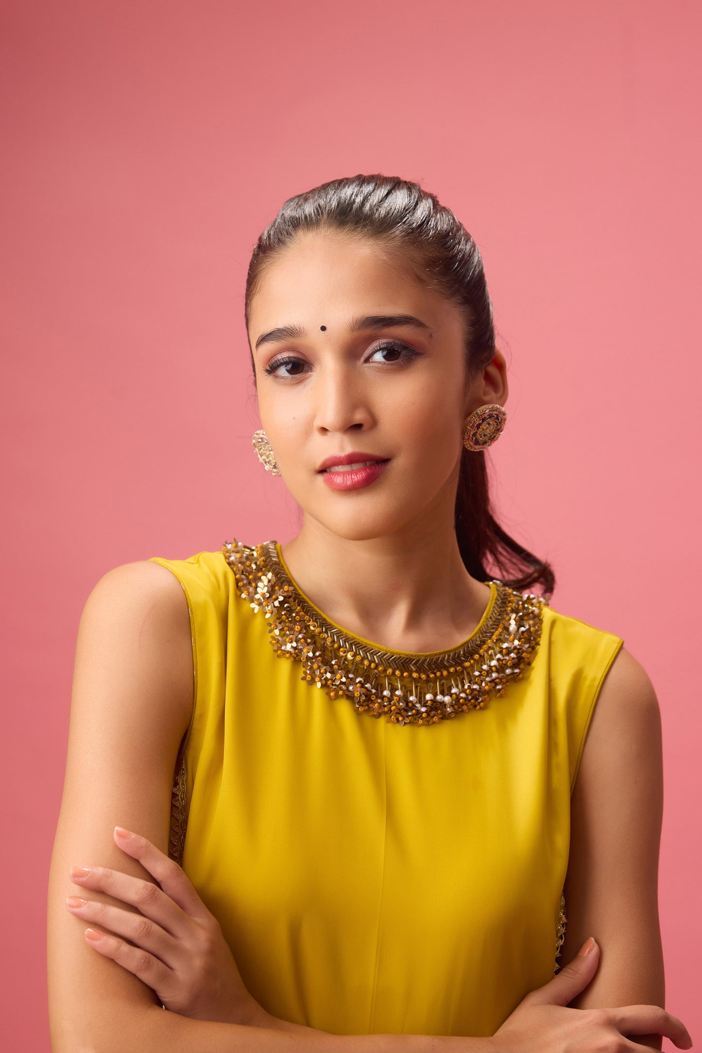 Olive kurta with foiling and hand emb. On neck paired with dhoti