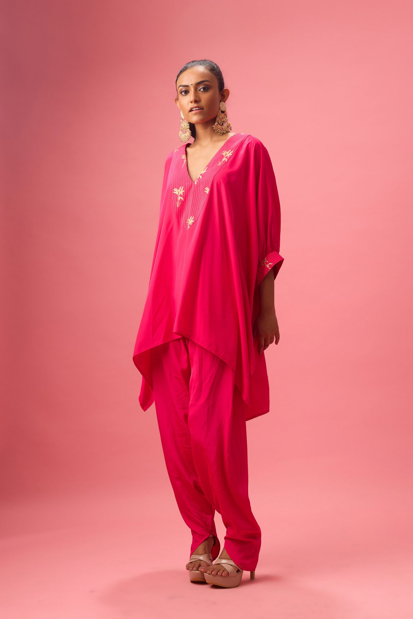 Rani Pink V neckline with dhagai and foiling kaftan detailing paired with salwar