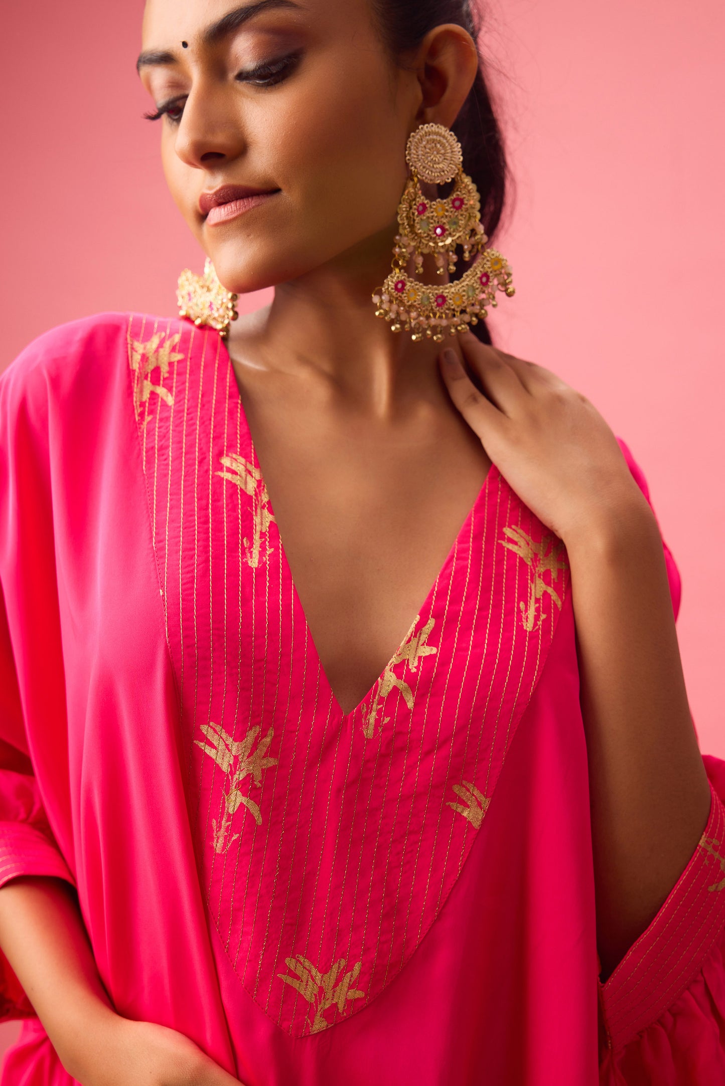 Rani Pink V neckline with dhagai and foiling kaftan detailing paired with salwar