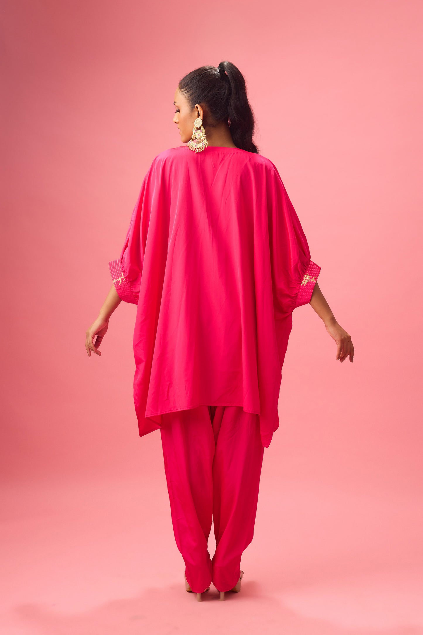 Rani Pink V neckline with dhagai and foiling kaftan detailing paired with salwar
