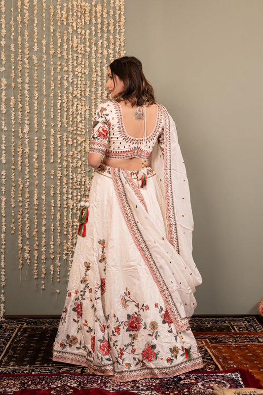 White soft silk lehenga choli with machine work