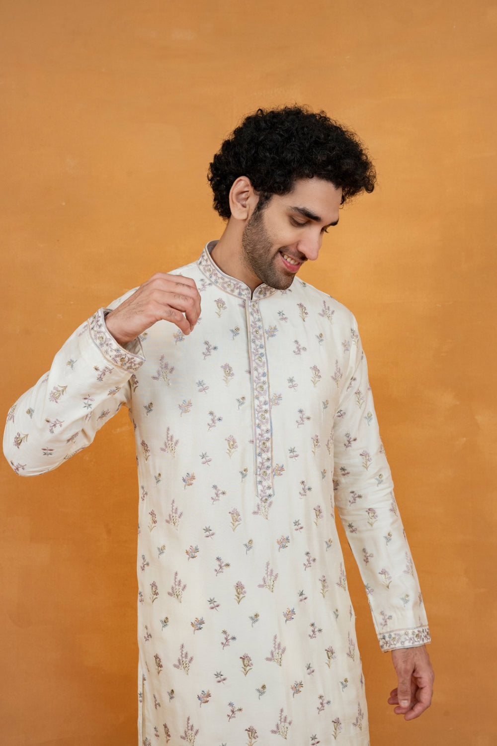 Off-White silk kurta set with resham embroidery and stone work