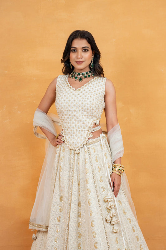 Ivory lucknowi zardozi embroidered lehenga choli with sequins work and pearls
