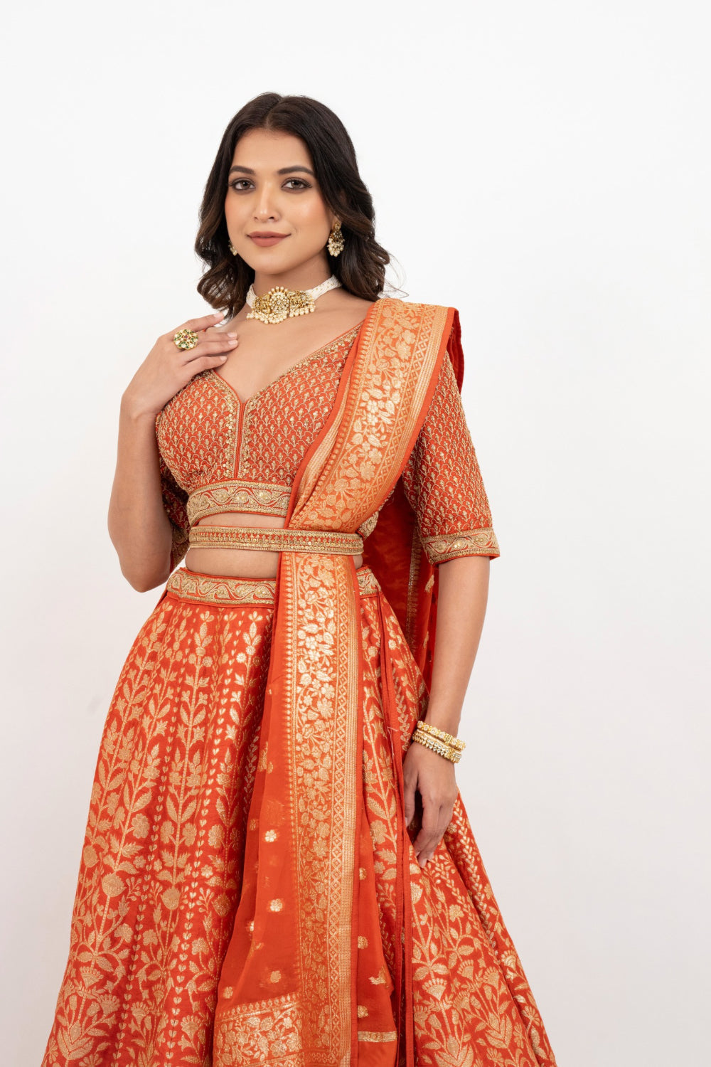 Orange banarasi silk zardozi embroidered lehenga choli with sequins work