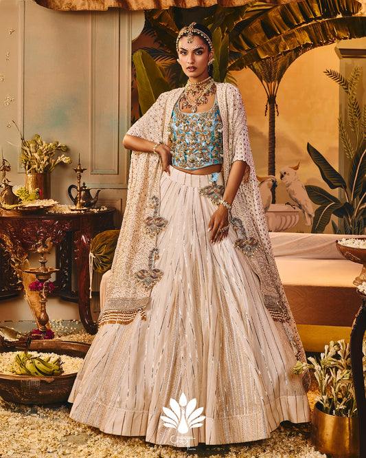 Custom cream and blue bridal lehenga