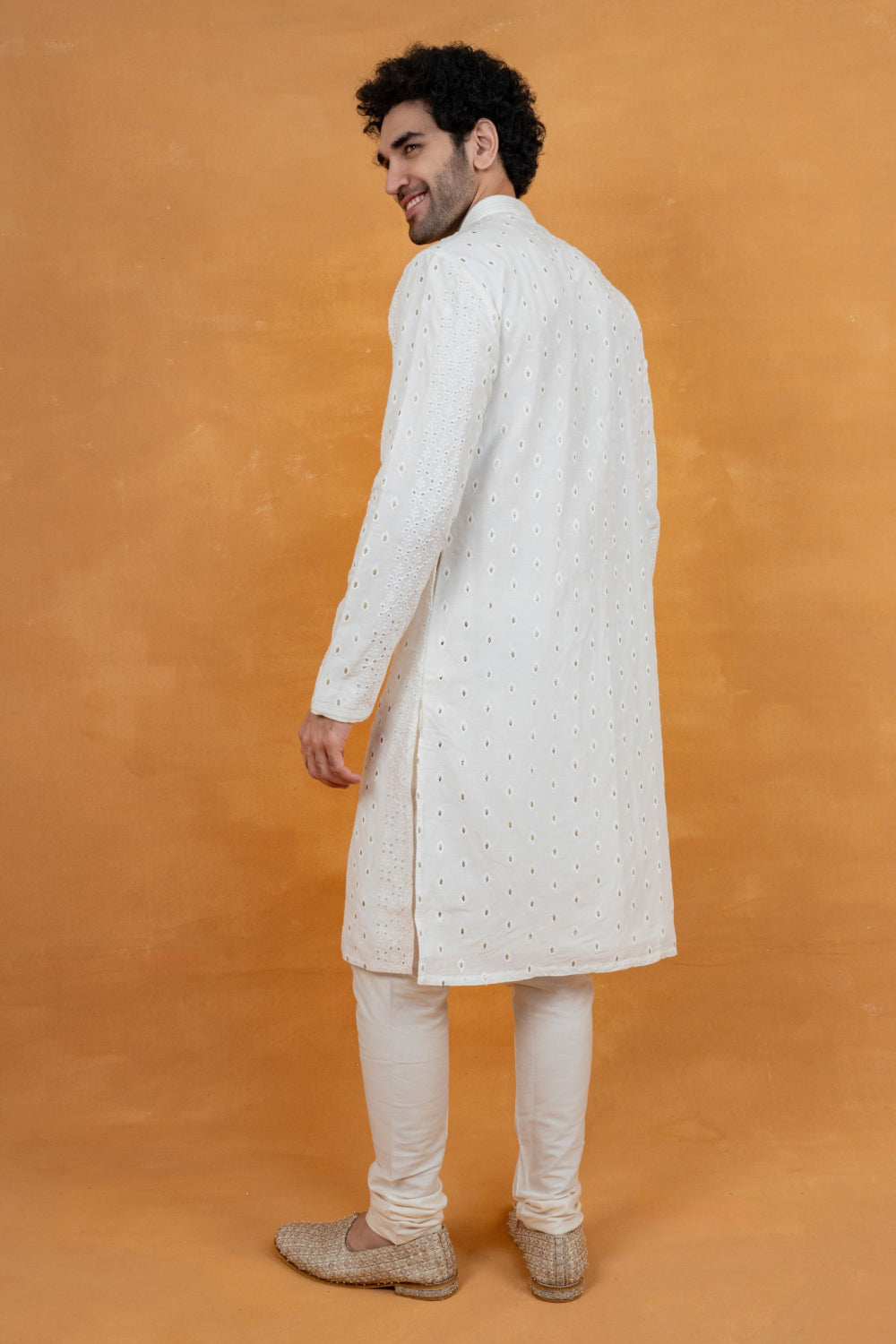 White silk kurta set with golden thread work