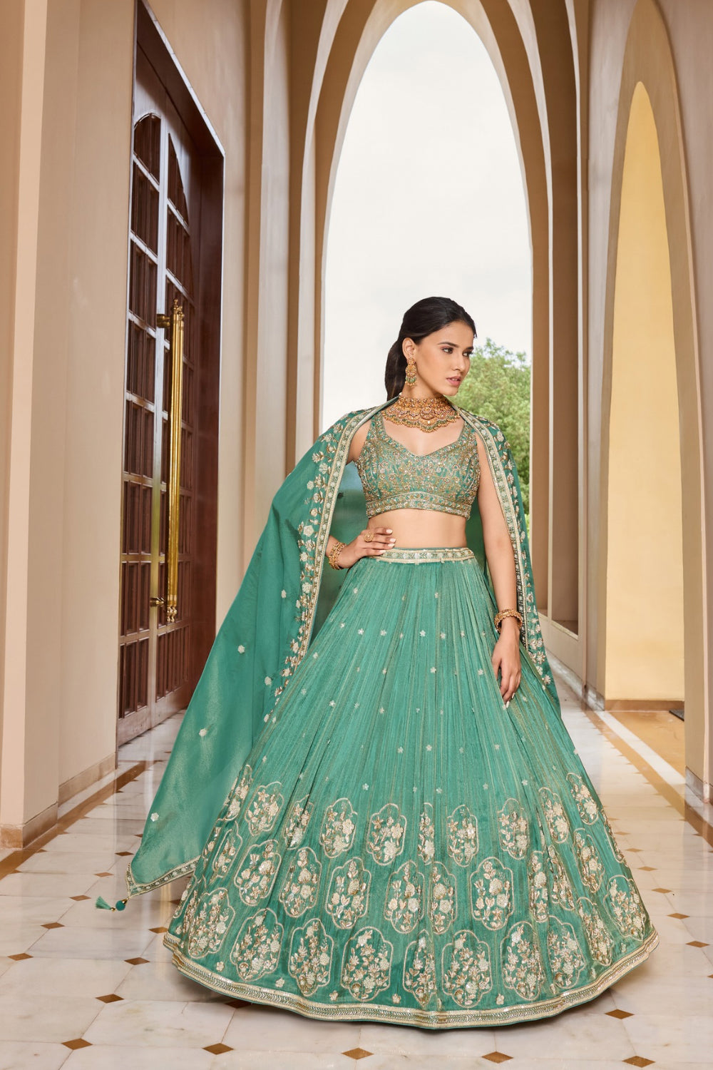 Sea green silk lehenga choli with thread embroidery and sequins work