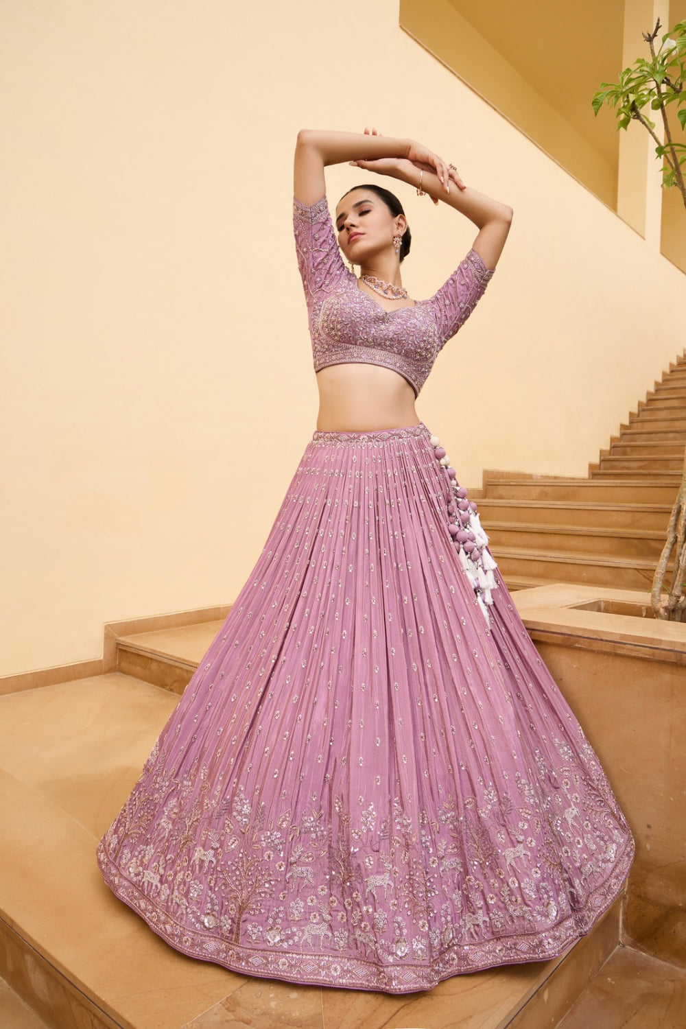 Mauve pink silk lehenga choli with thread embroidery and hand cut dana work