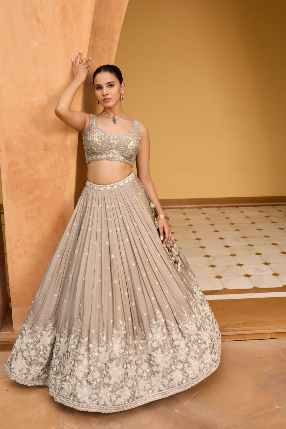 Light taupe silk lehenga choli with thread embroidery and sequins work