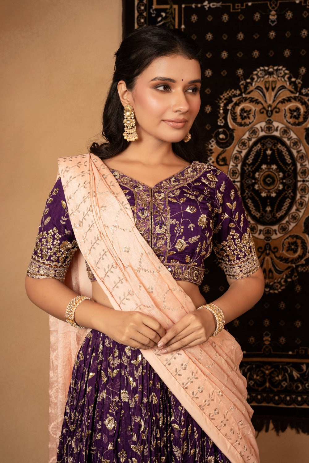 Purple organza lehenga with kasab and sequin work