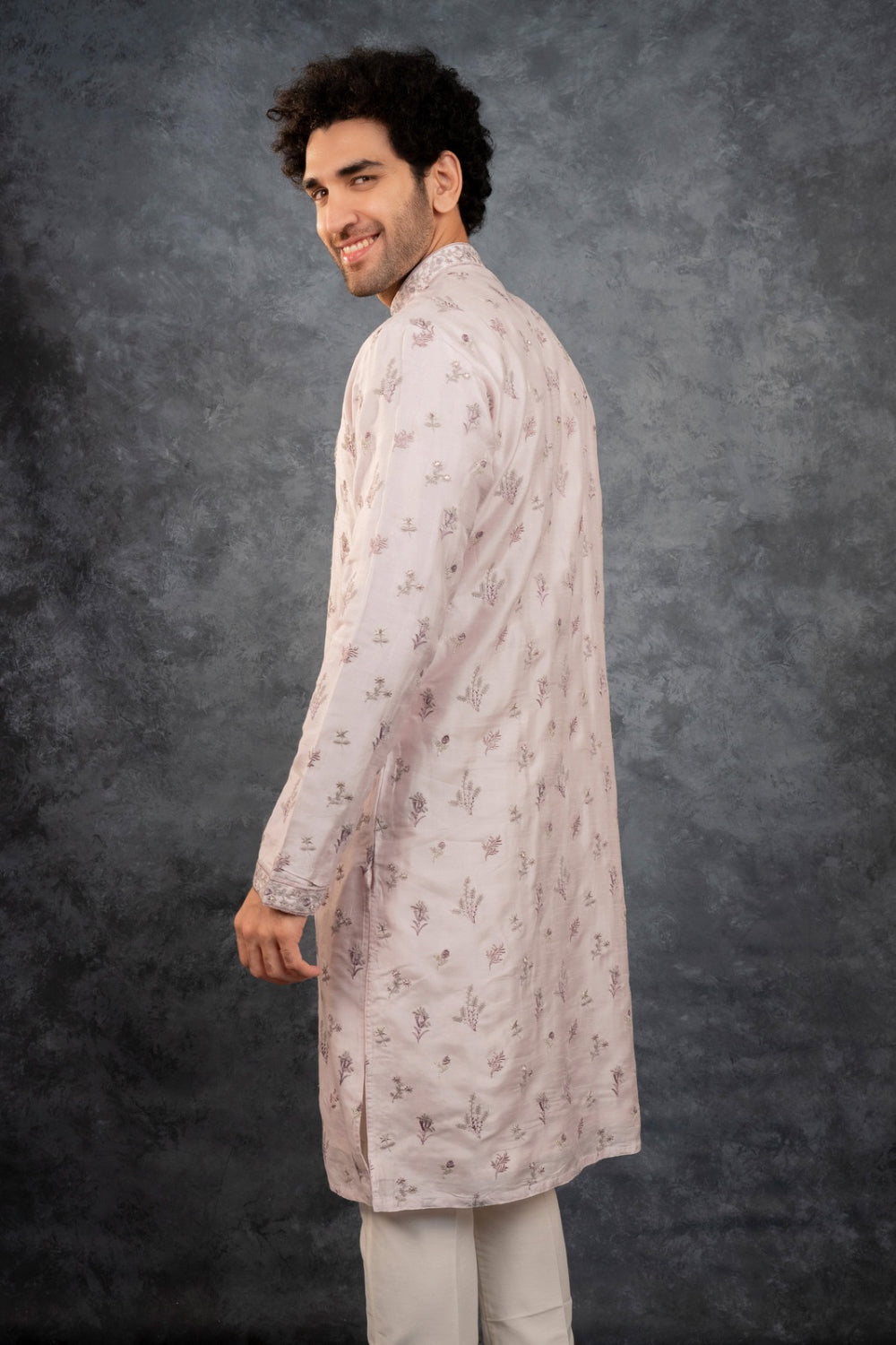 Cream silk kurta set with resham embroidery and sequins work