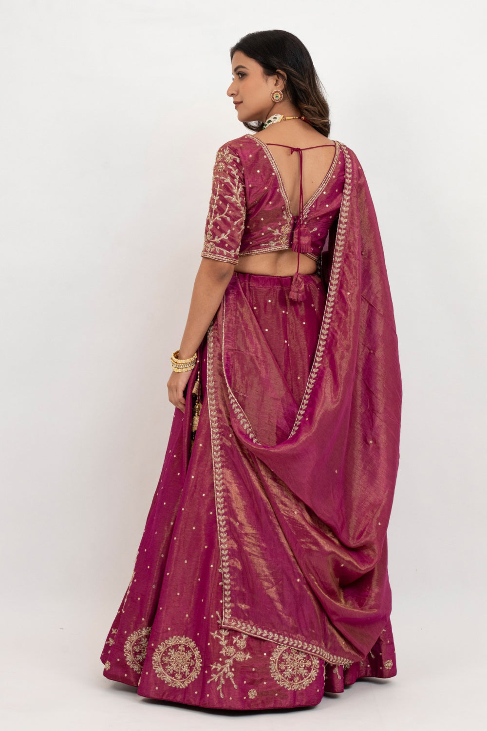 Magenta tissue silk zardozi embroidered lehenga choli with hand cut dana and beads work