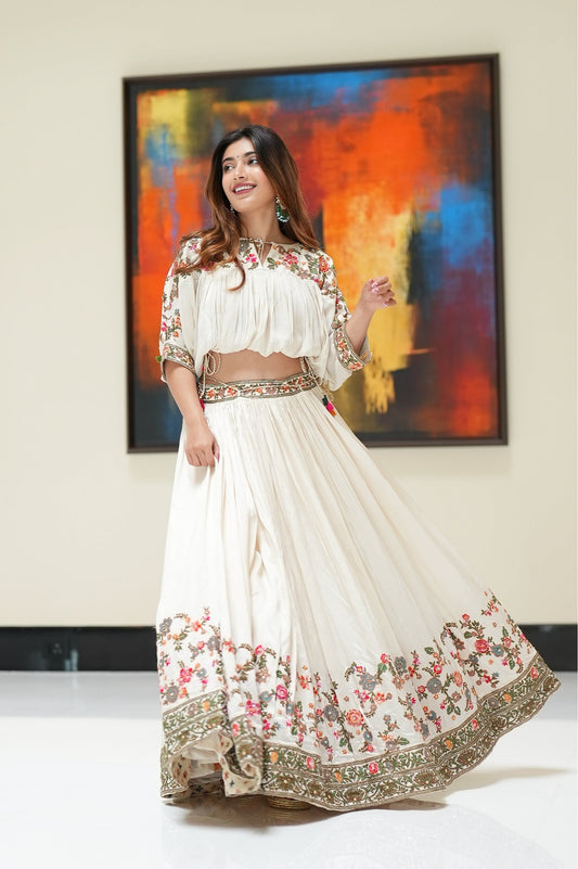 Ivory Slub Silk Printed And Embroidered Thread Pleated Skirt & Top Set