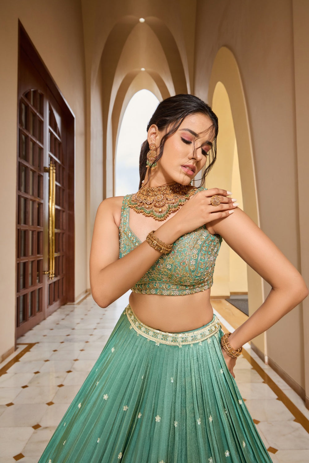Sea green silk lehenga choli with thread embroidery and sequins work