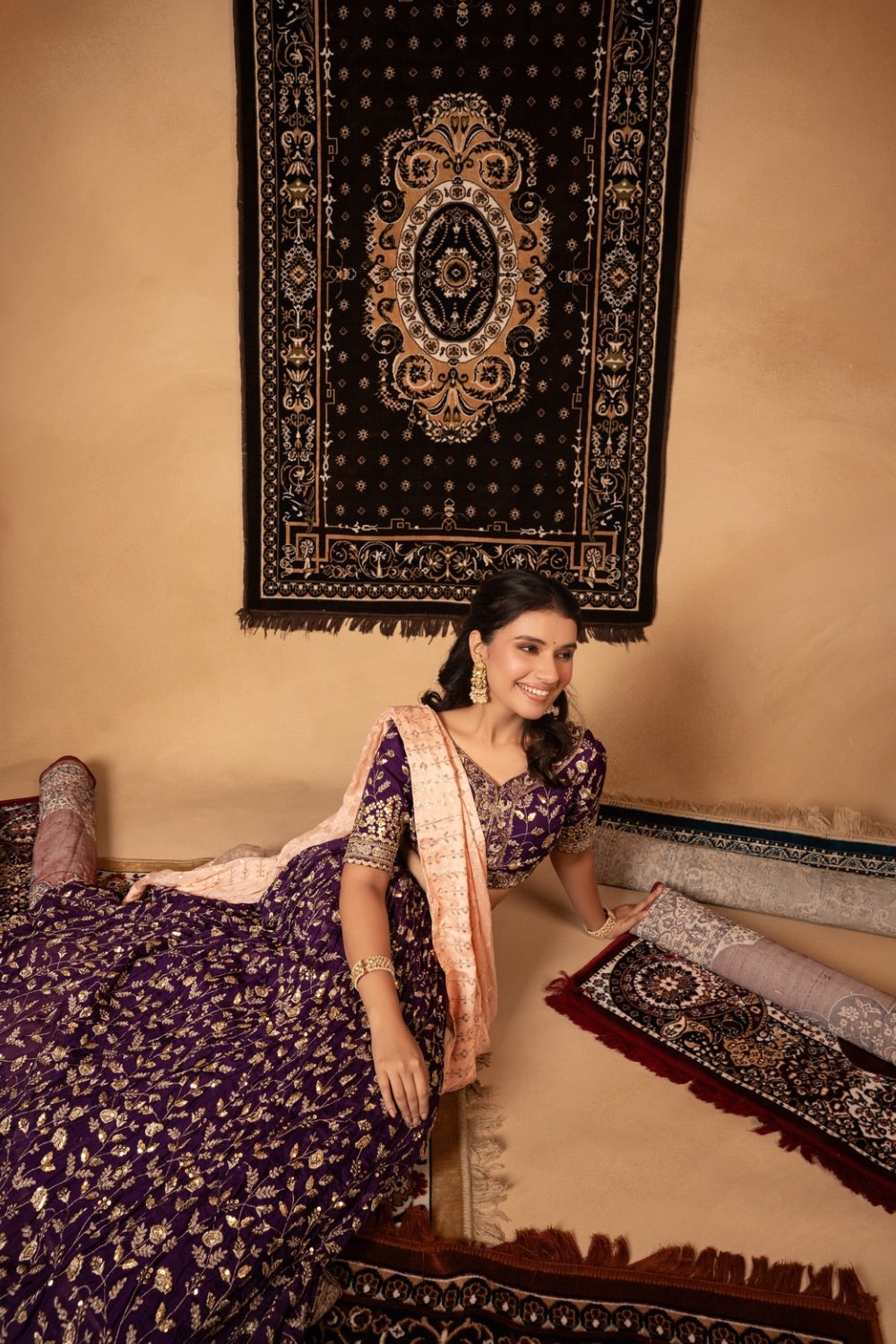 Purple organza lehenga with kasab and sequin work