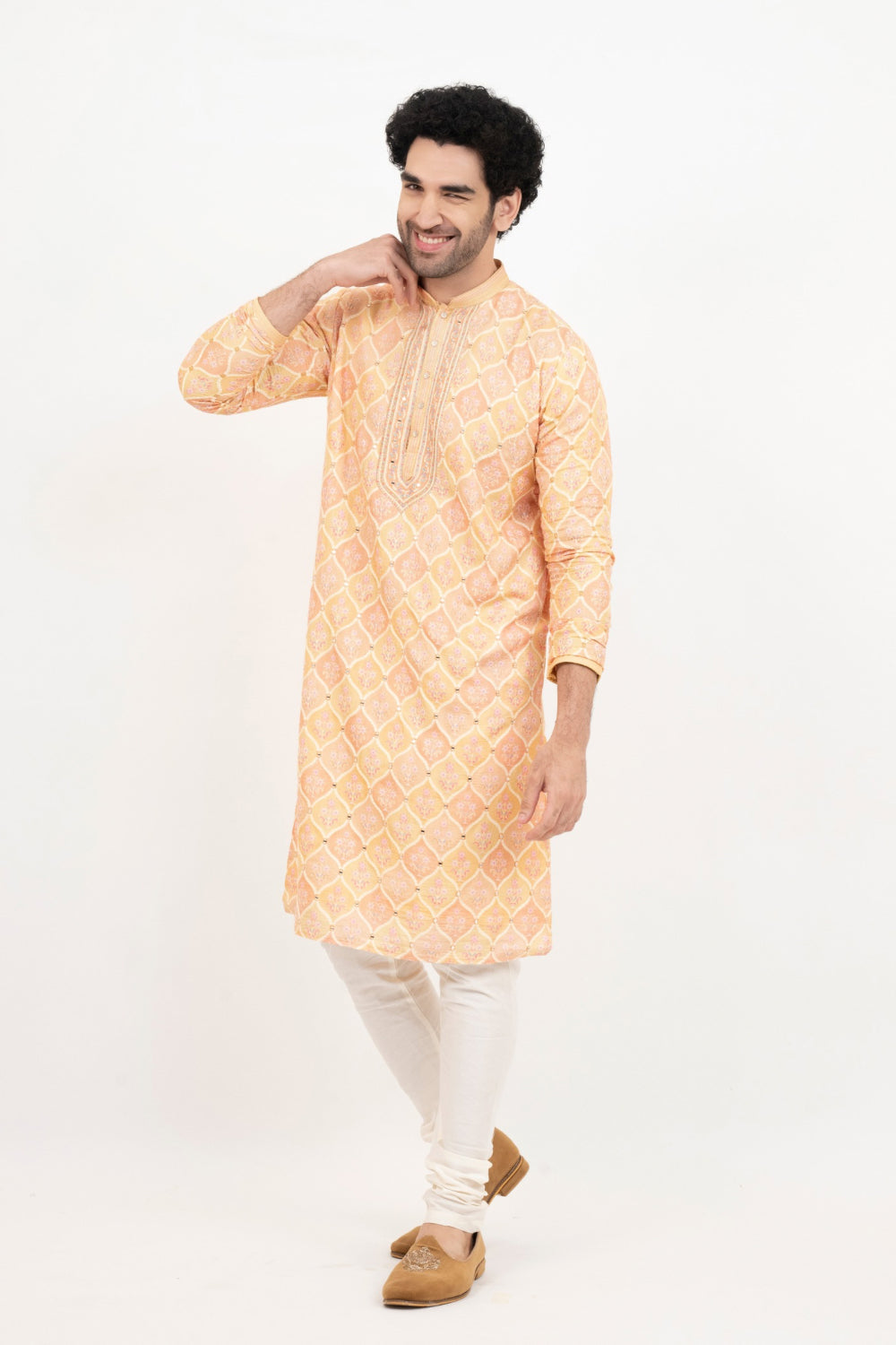 Light orange lucknowi position print kurta set with morror and thread work on yoke