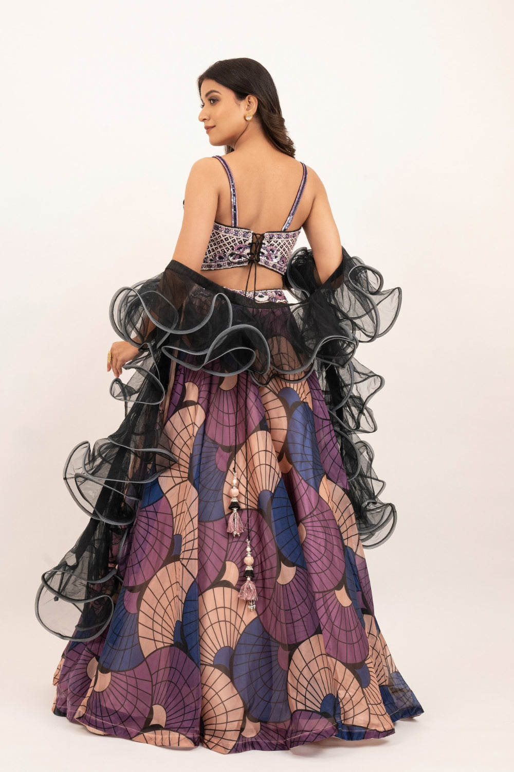 Multicolour organza lehenga choli with sequins, hand cut dana and stone work