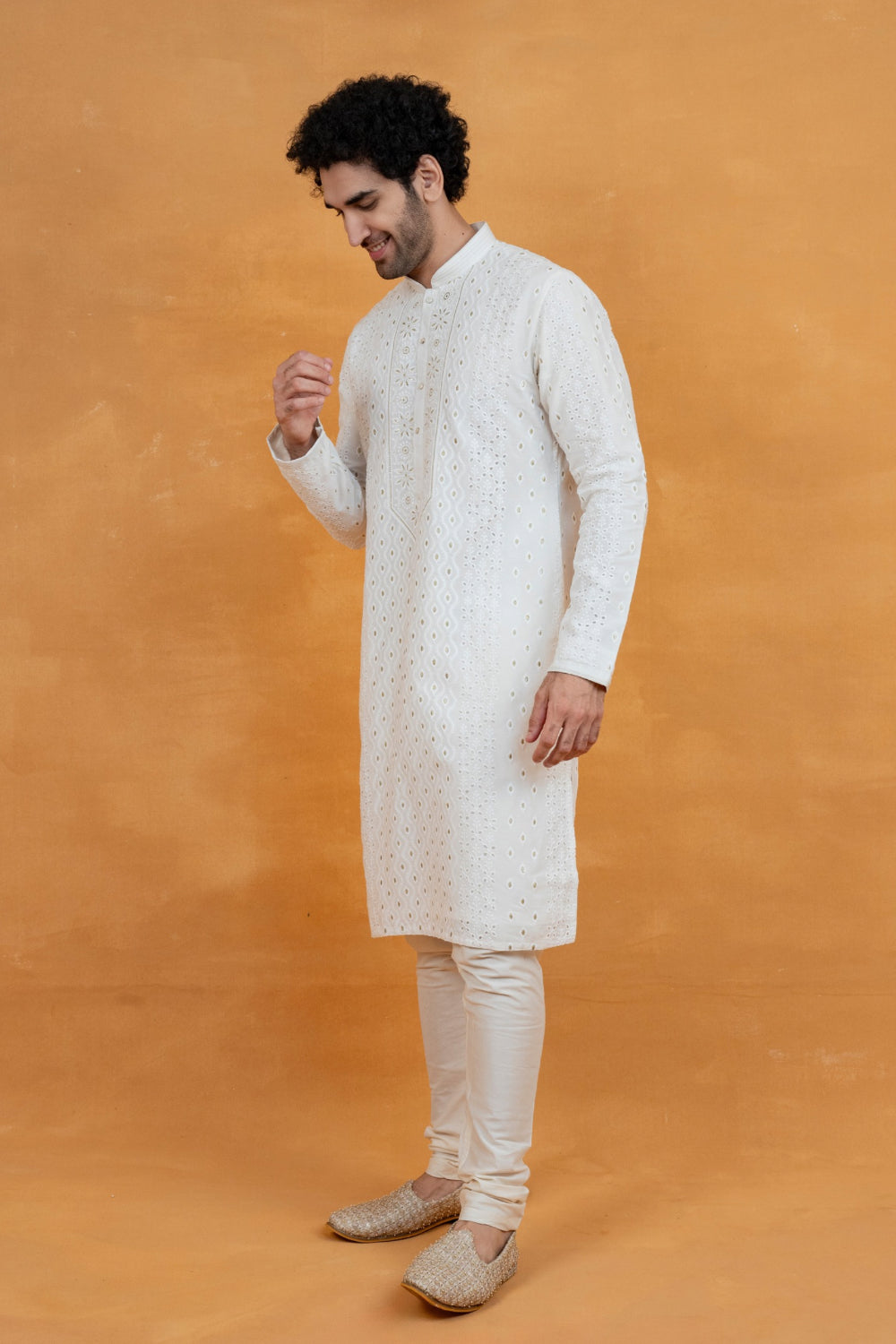 White silk kurta set with golden thread work