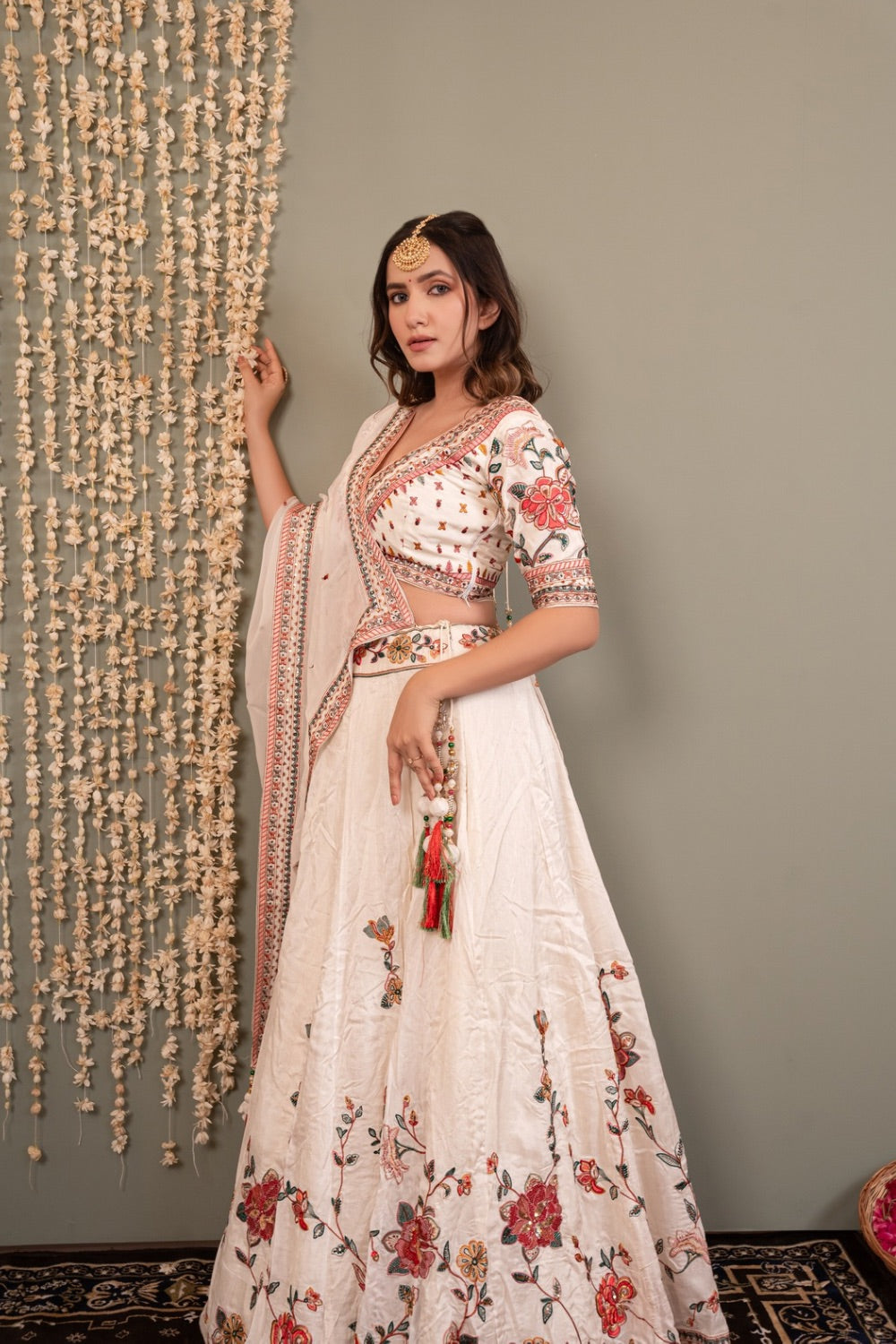 White soft silk lehenga choli with machine work