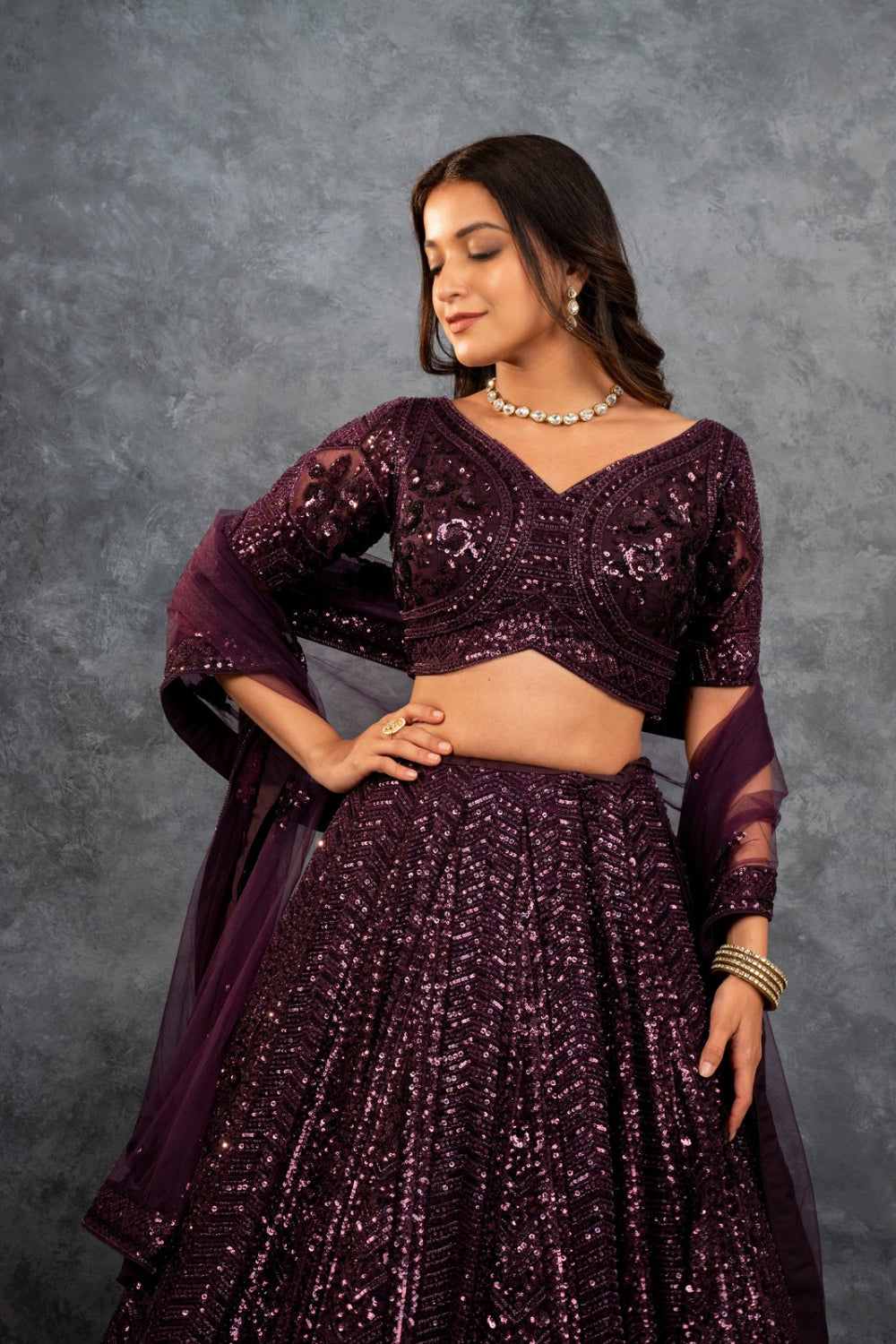 Wine net lehenga choli with sequins, hand cut dana and dori work