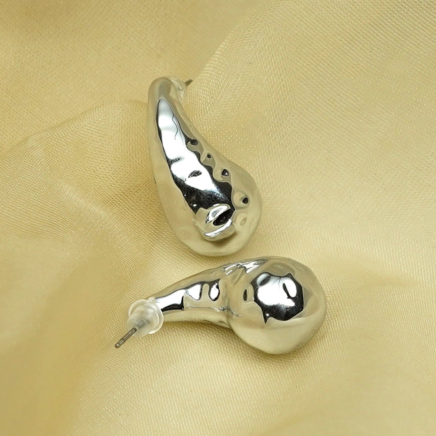 Zevar Club Glossy Silver Tone Stainless Steel Tarnish Free Waterproof Sculpted Tear Drop-Shaped Stud Earrings for Women