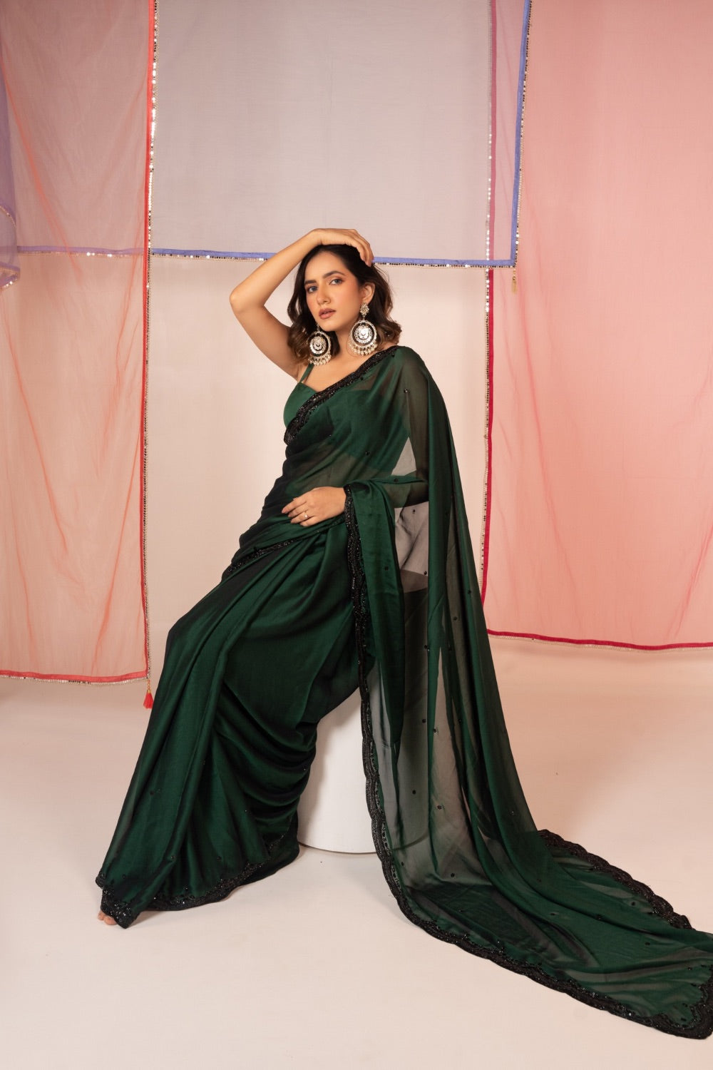 Bottle green satin silk saree and unstitched blouse piece