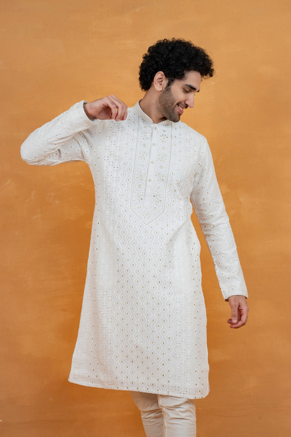 White silk kurta set with golden thread work