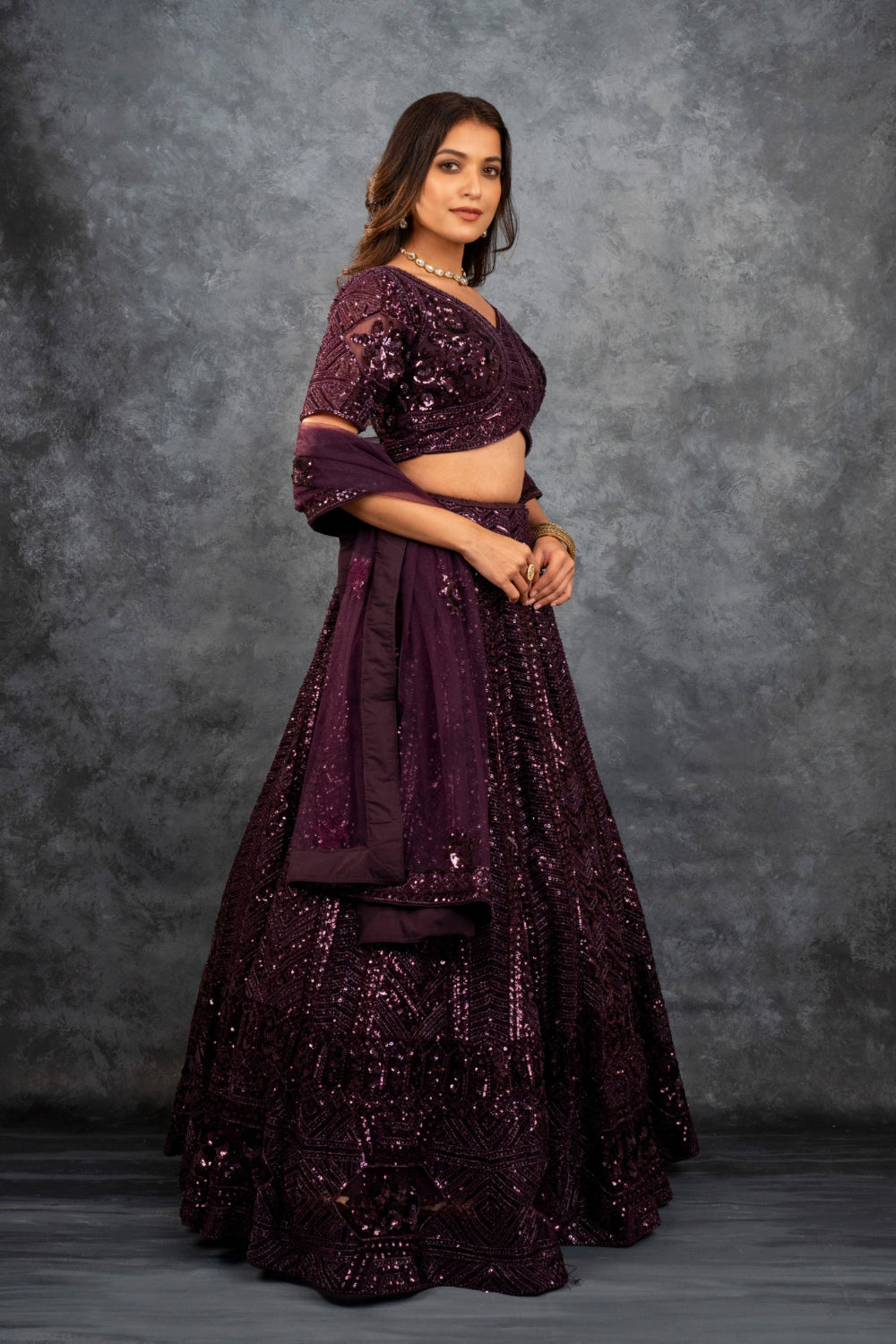 Wine net lehenga choli with sequins, hand cut dana and dori work