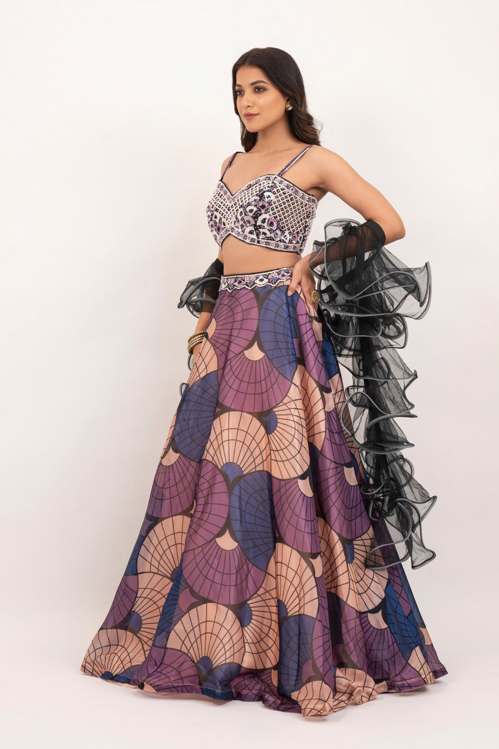 Multicolour organza lehenga choli with sequins, hand cut dana and stone work