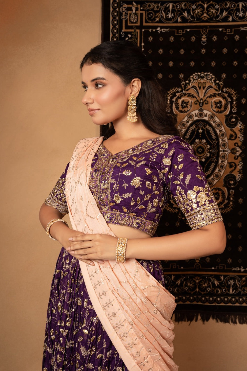 Purple organza lehenga with kasab and sequin work