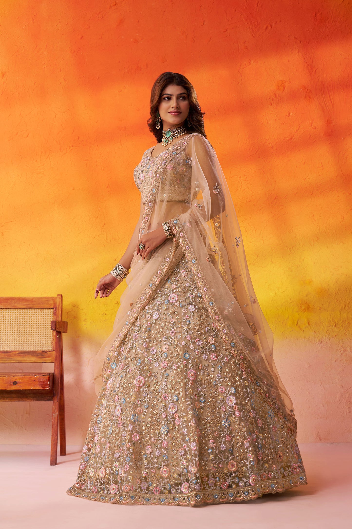 Beige Net Heavy Sequins & Floral Embroidery Bridal Lehenga