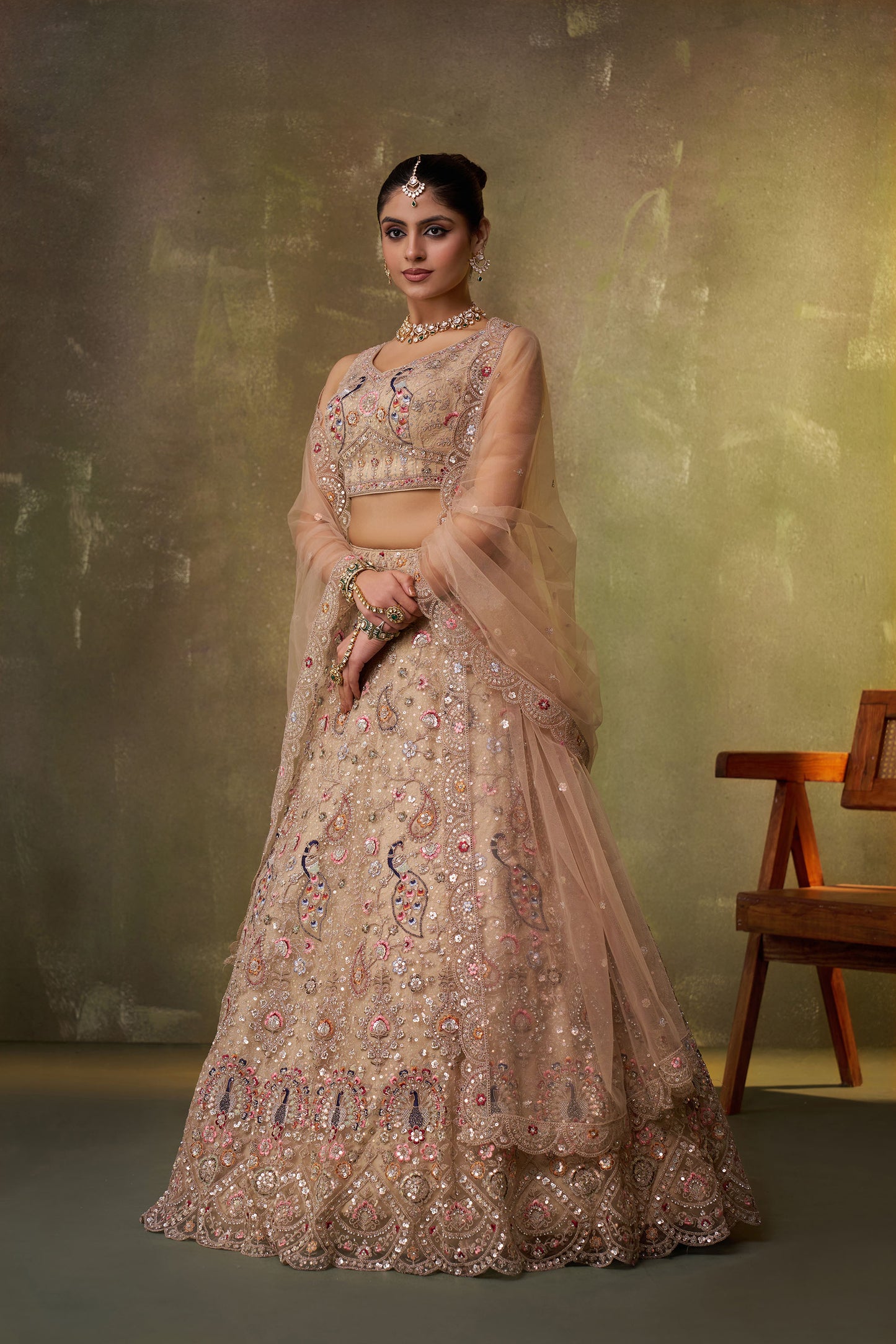 Beige Net Heavy Sequins & Peacock Embroidery Bridal Lehenga