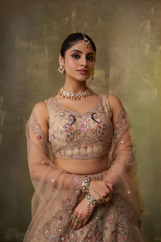 Beige Net Heavy Sequins & Peacock Embroidery Bridal Lehenga