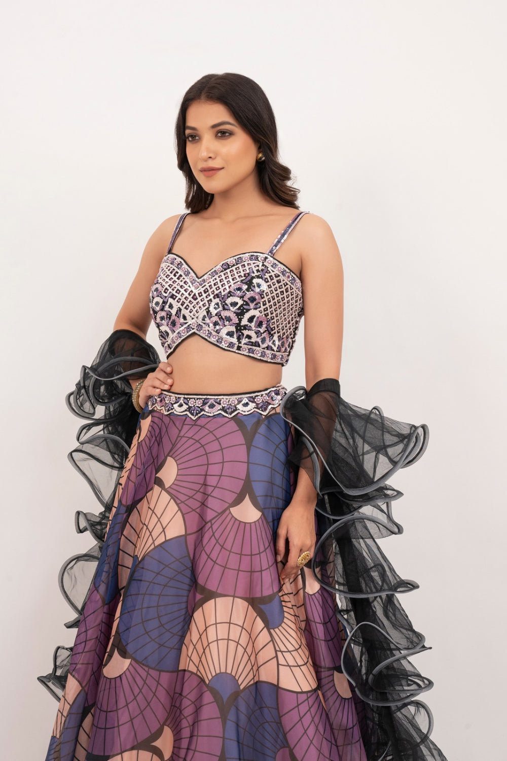 Multicolour organza lehenga choli with sequins, hand cut dana and stone work