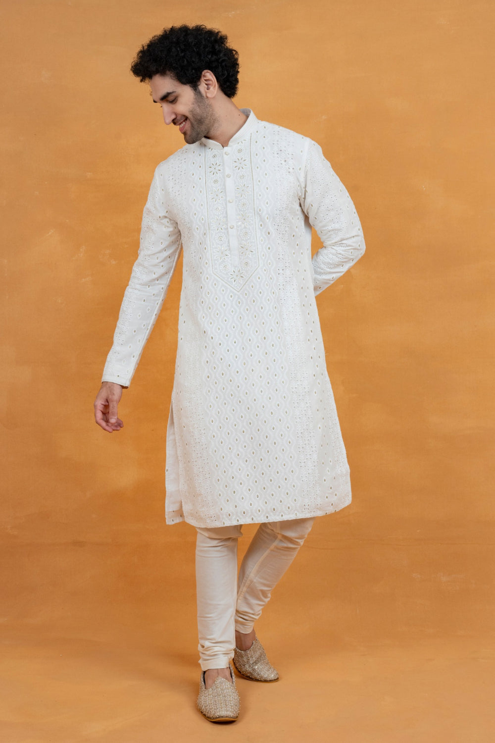 White silk kurta set with golden thread work