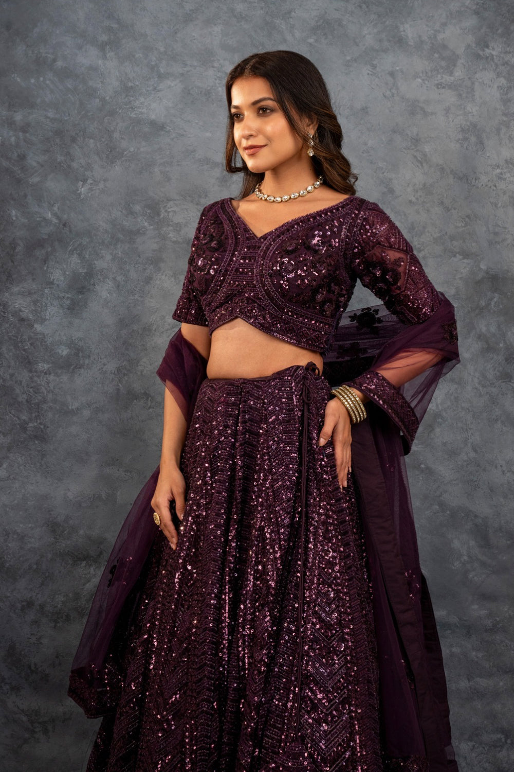 Wine net lehenga choli with sequins, hand cut dana and dori work