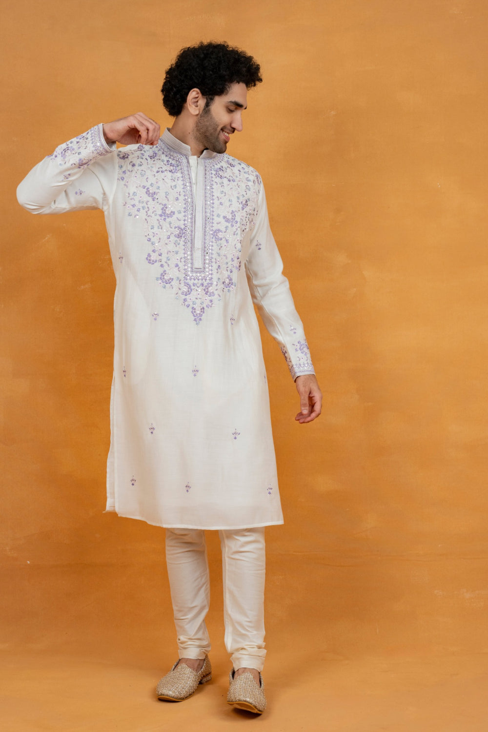 Cream silk kurta set with lavender resham embroidery and mirror work