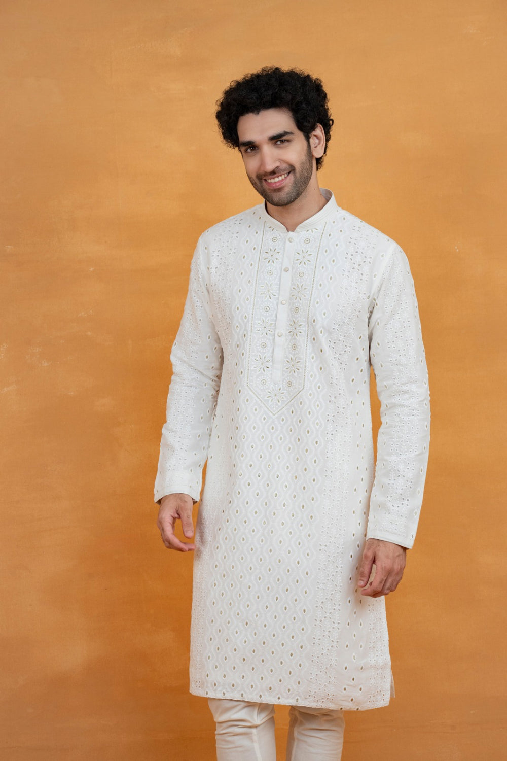 White silk kurta set with golden thread work